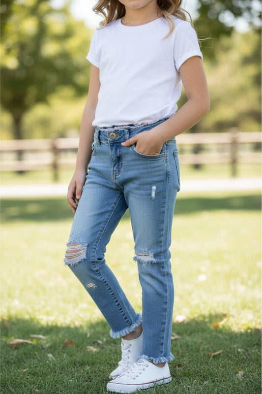 Distressed hem skinny jeans